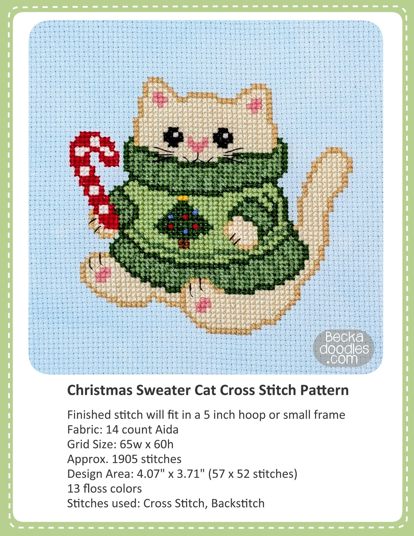 Cross stitch pattern cover for "Christmas Sweater Cat", showing a completed stitched design of a cream-colored cat wearing a green sweater and holding a red-and-white candy cane on a light blue fabric, with text below detailing the pattern specifications.